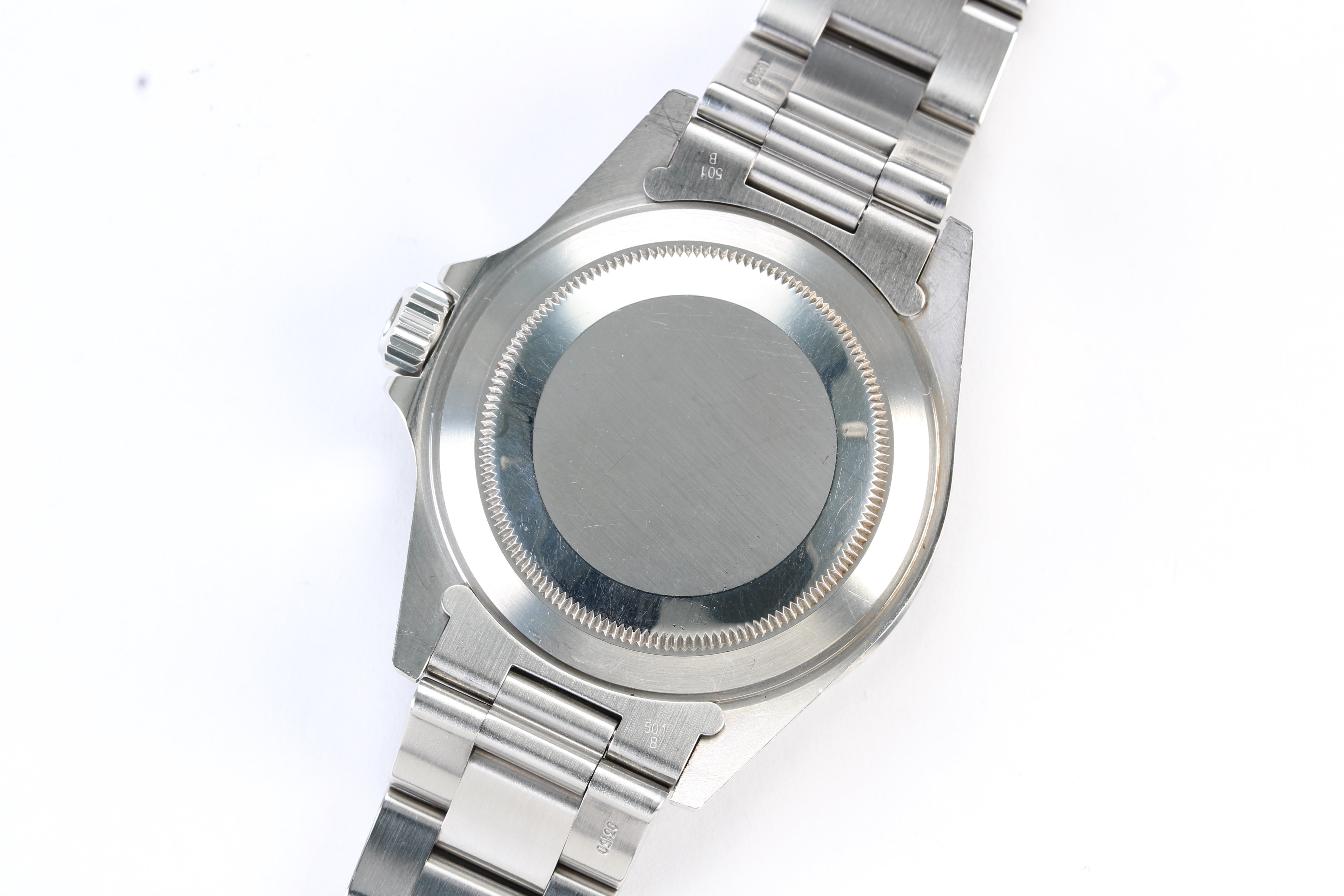 Rolex Submariner 14060M “Four Lines” on Oyster Bracelet with Warranty Card and Booklets