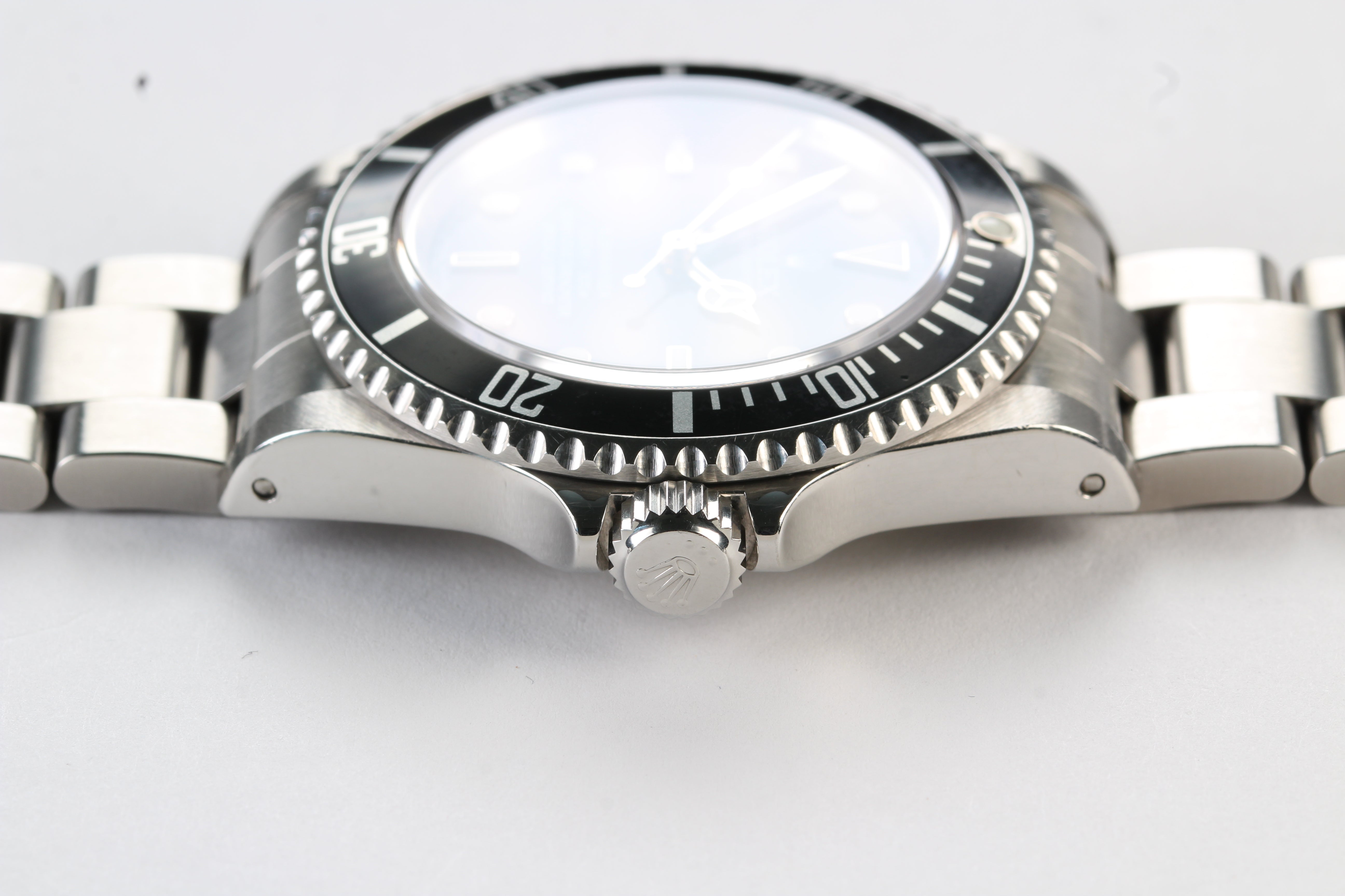 Rolex Submariner 14060M “Four Lines” on Oyster Bracelet with Warranty Card and Booklets