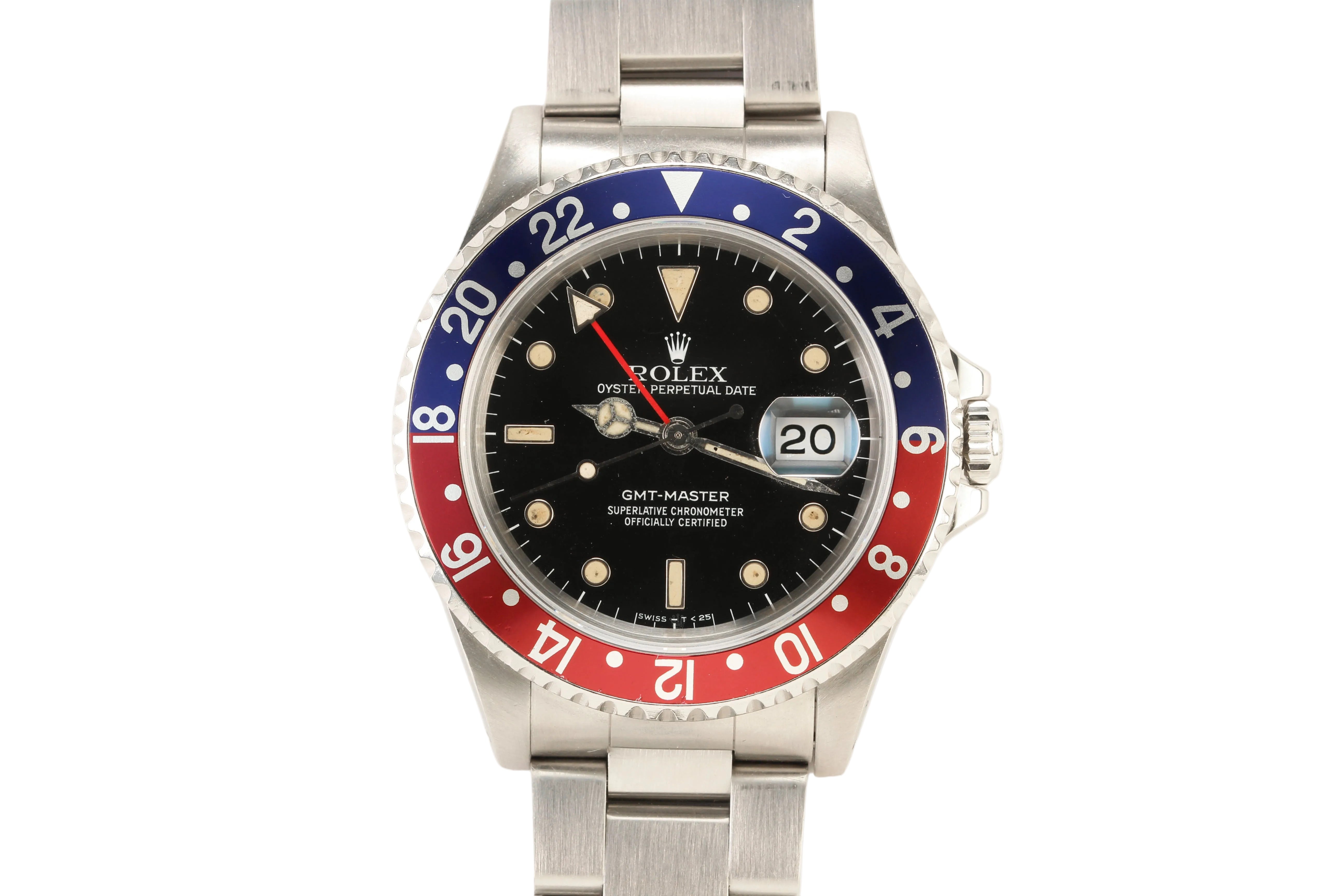 Rolex GMT Master wristwatch with a stainless steel Oyster bracelet, featuring a black dial, black date window, and a distinctive red and blue Pepsi-style bezel.