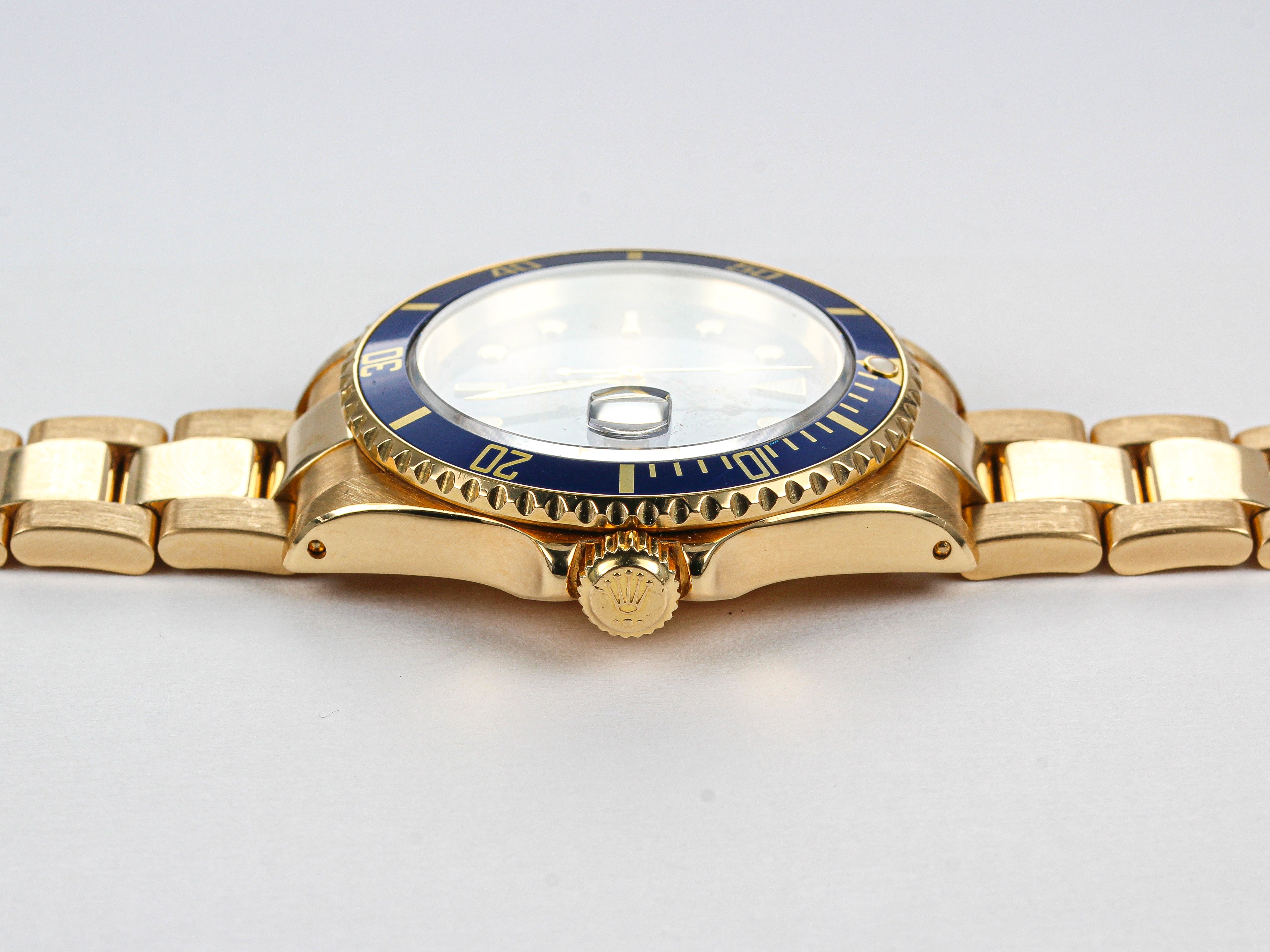 Rolex Submariner 16618 Blue Dial in Yellow Gold on Oyster Bracelet