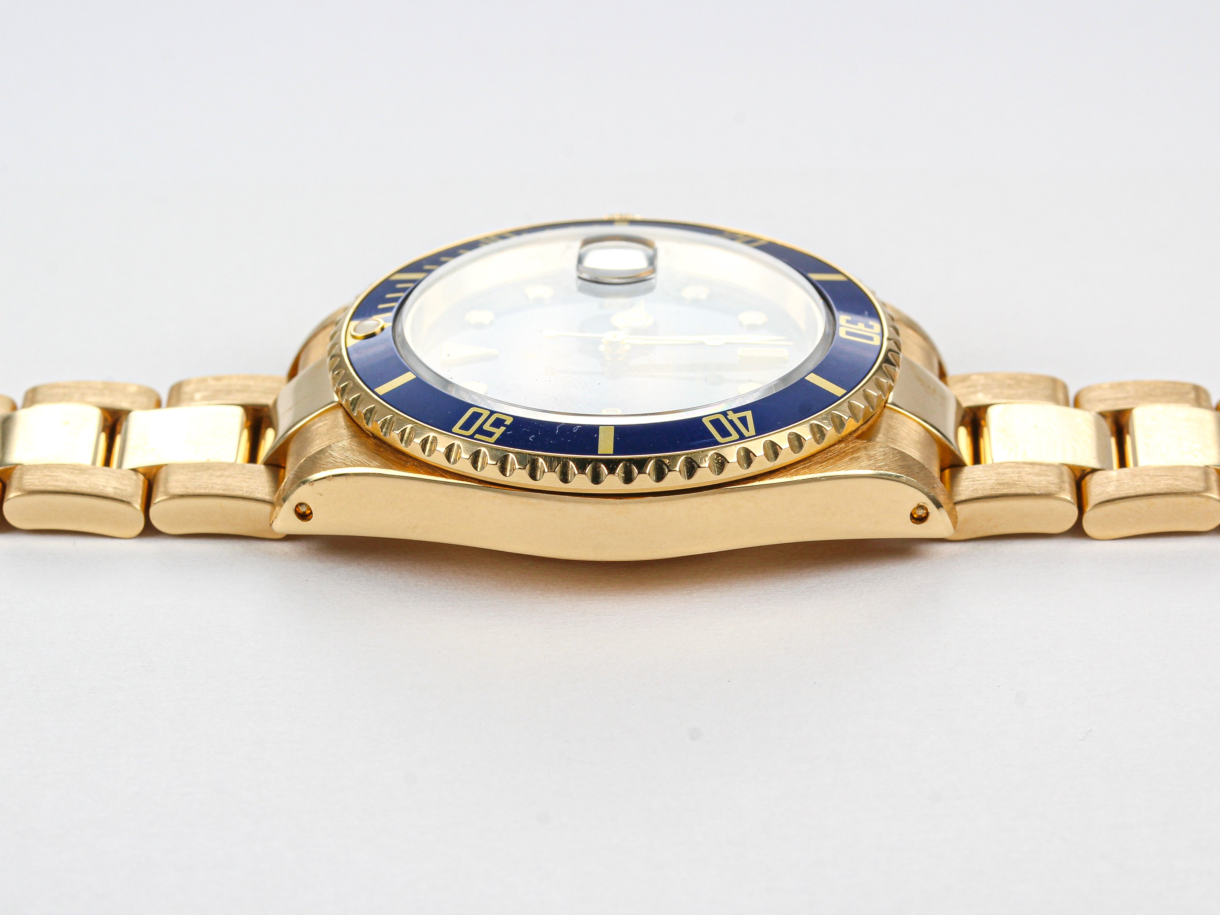 Rolex Submariner 16618 Blue Dial in Yellow Gold on Oyster Bracelet