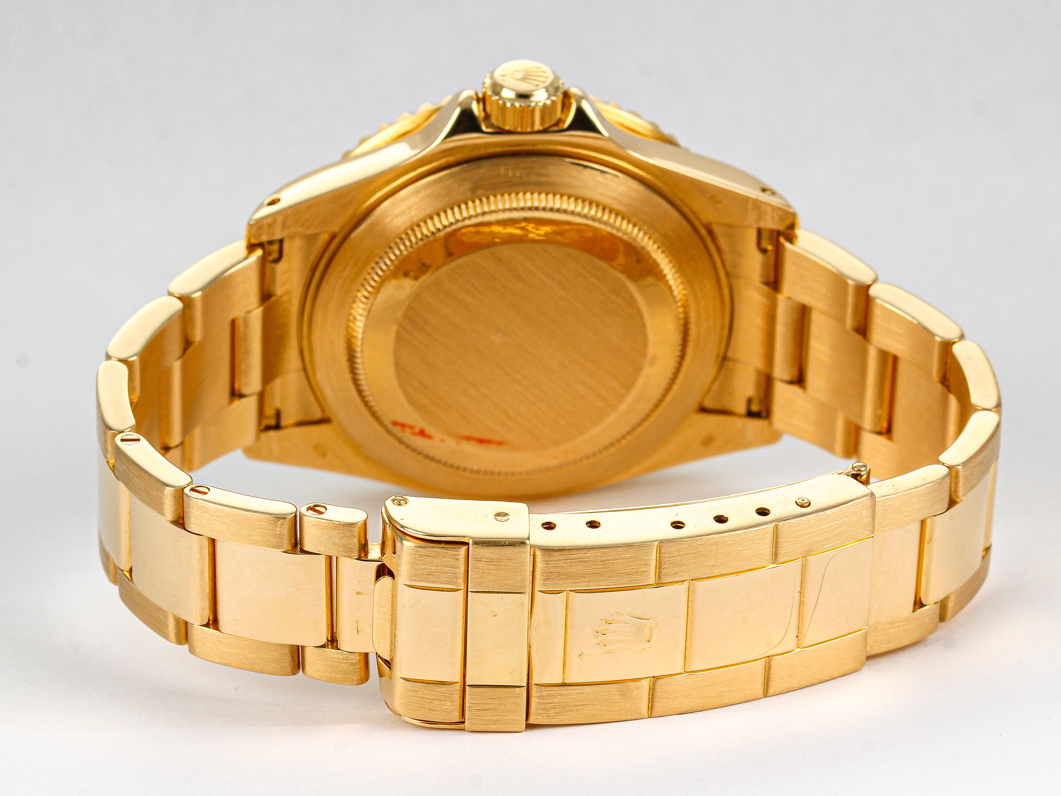 Rolex Submariner 16618 Blue Dial in Yellow Gold on Oyster Bracelet
