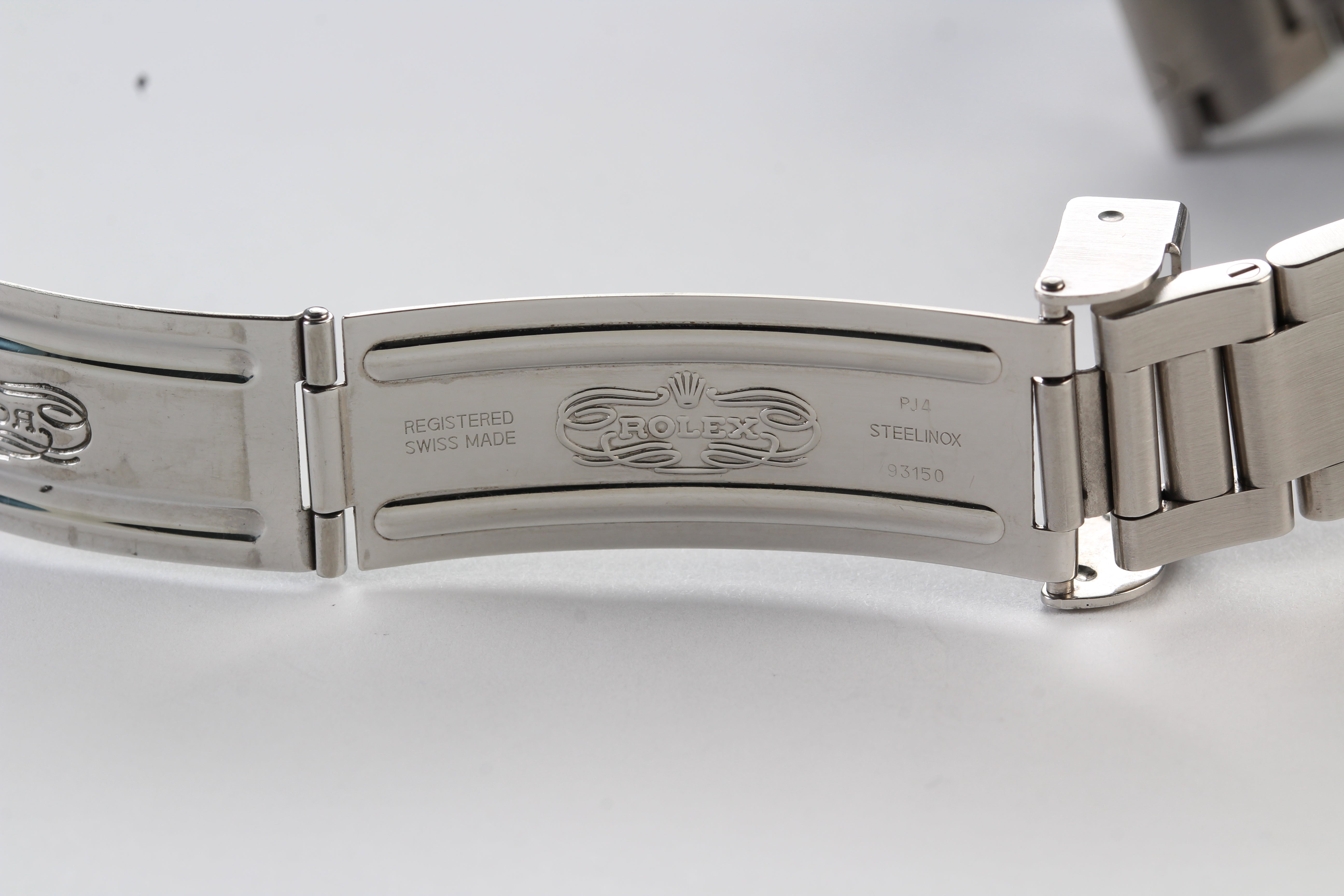 Rolex Submariner 14060M “Four Lines” on Oyster Bracelet with Warranty Card and Booklets