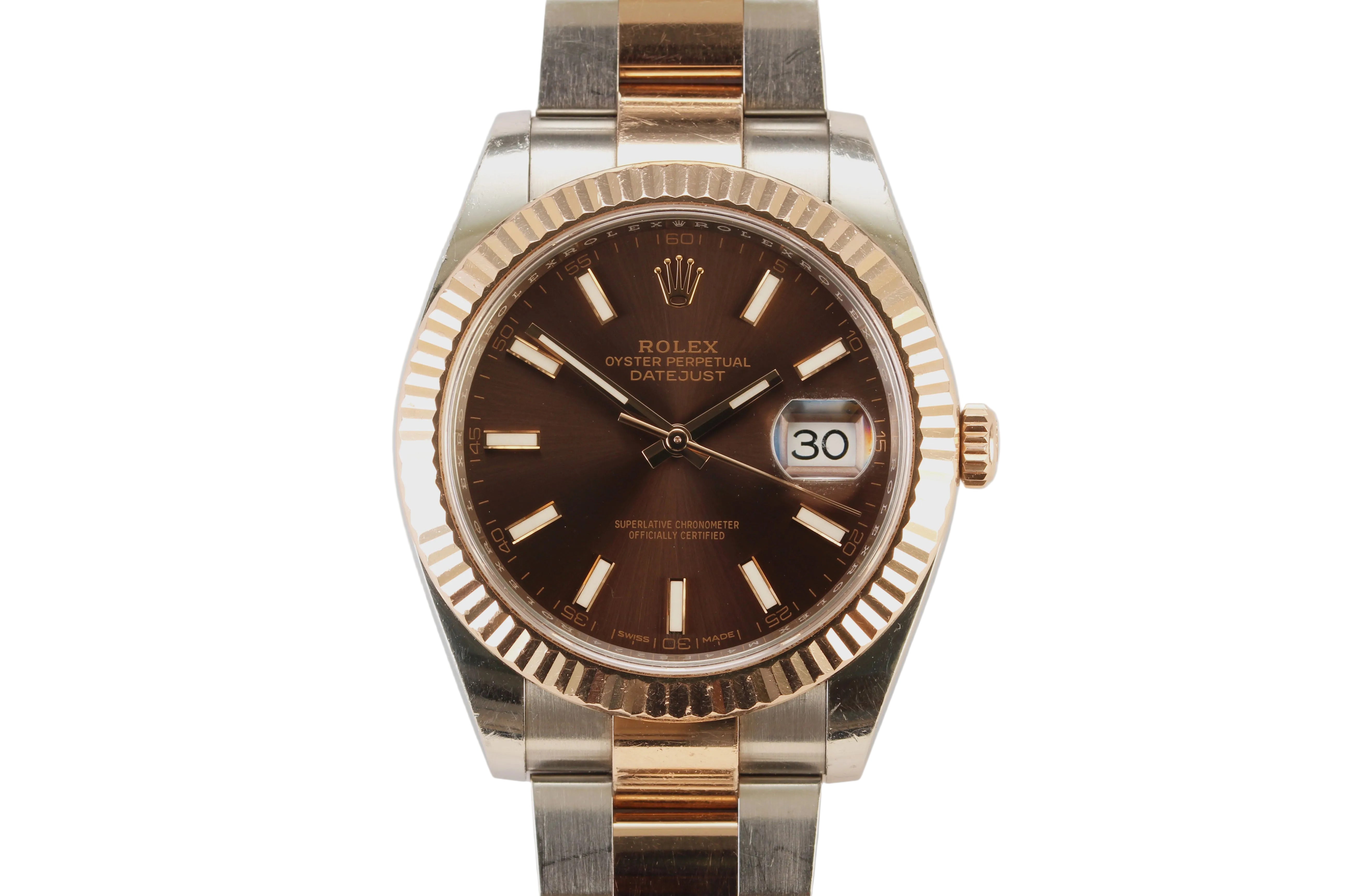 Rolex watch with brown dial and gold and silver band on a white background