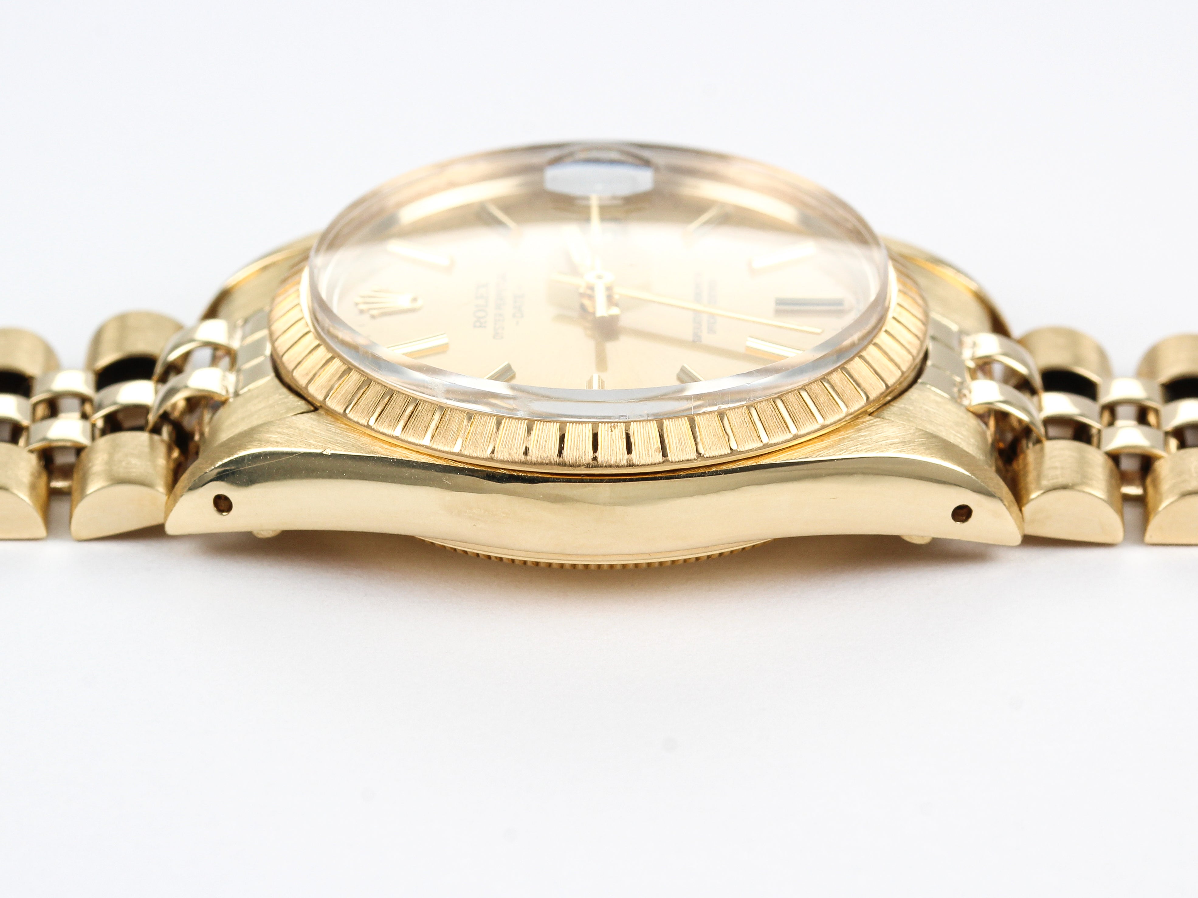 Rolex Date 15000 Champagne Dial in 14K Yellow Gold Case and Jubilee Bracelet