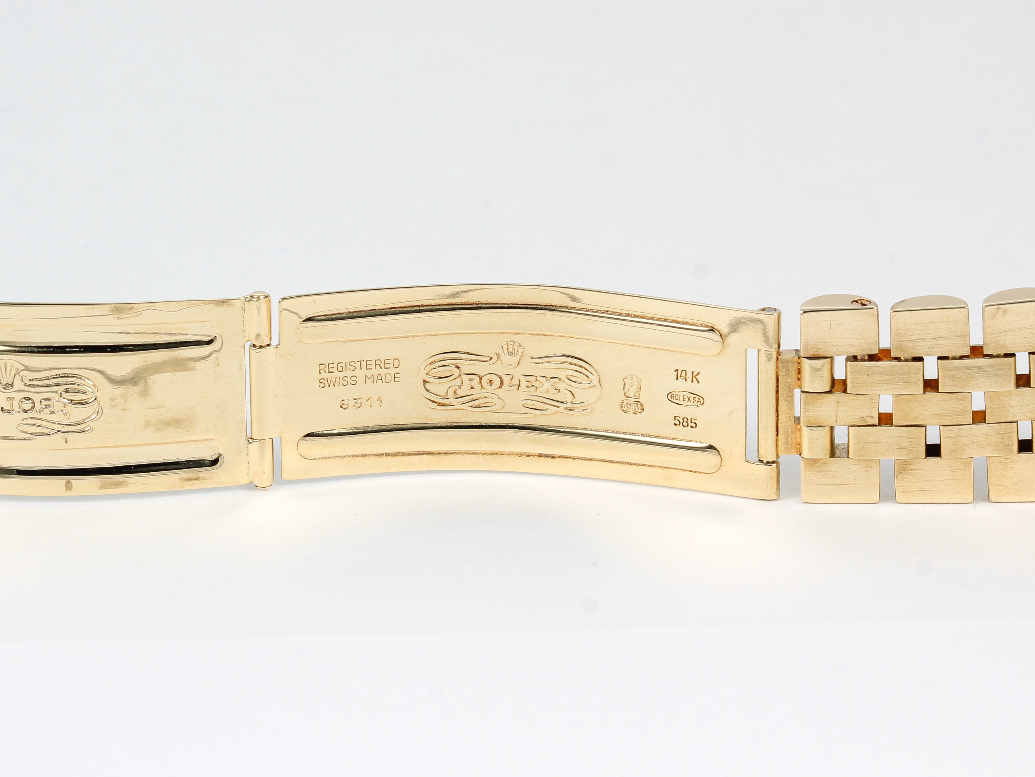 Rolex Date 15000 Champagne Dial in 14K Yellow Gold Case and Jubilee Bracelet