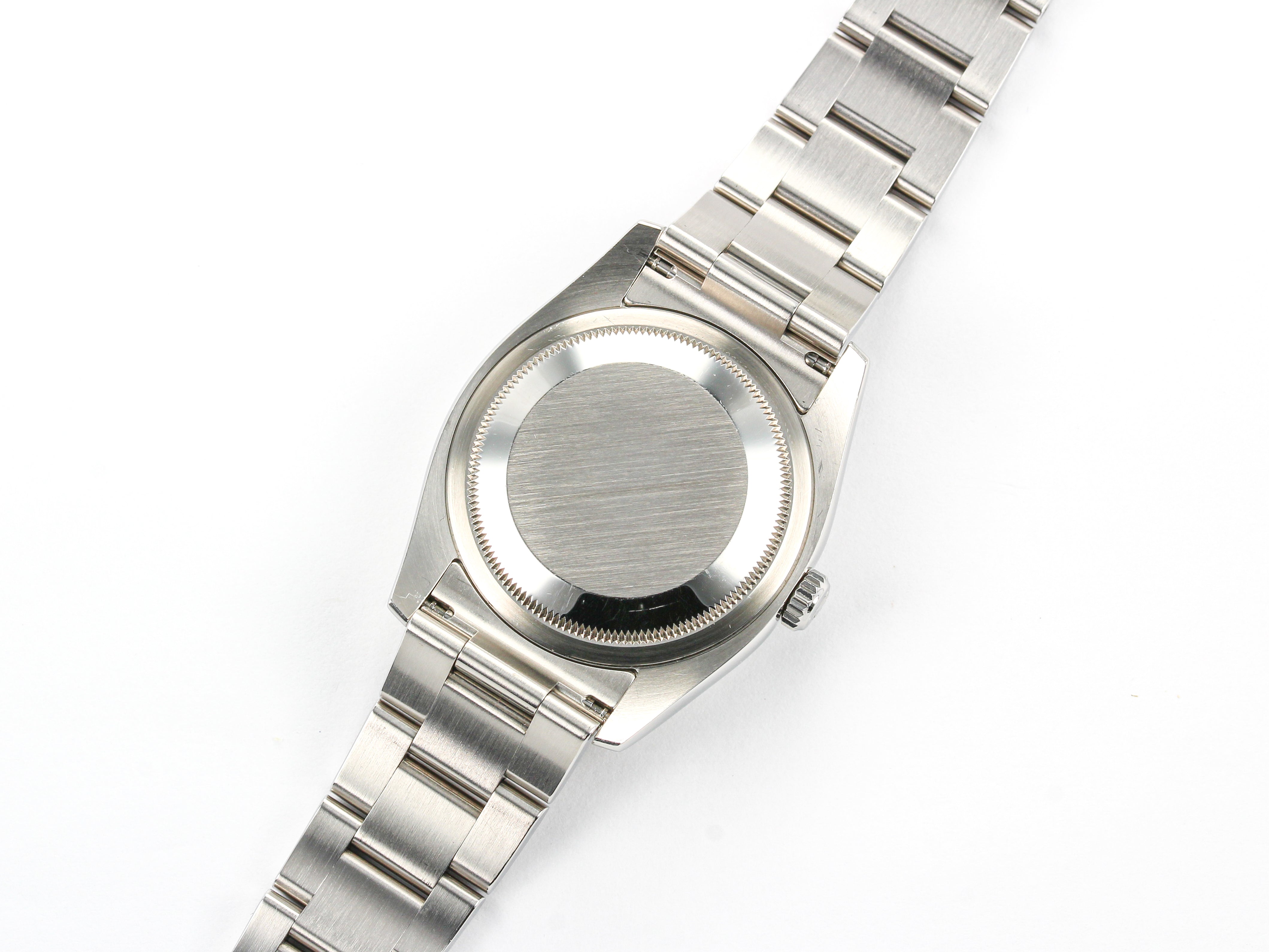 Rolex Datejust 116200 Smooth Bezel with White Roman Numeral Dial on Oyster Bracelet with Papers